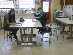 students working at tables