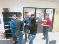 students speaking in circle